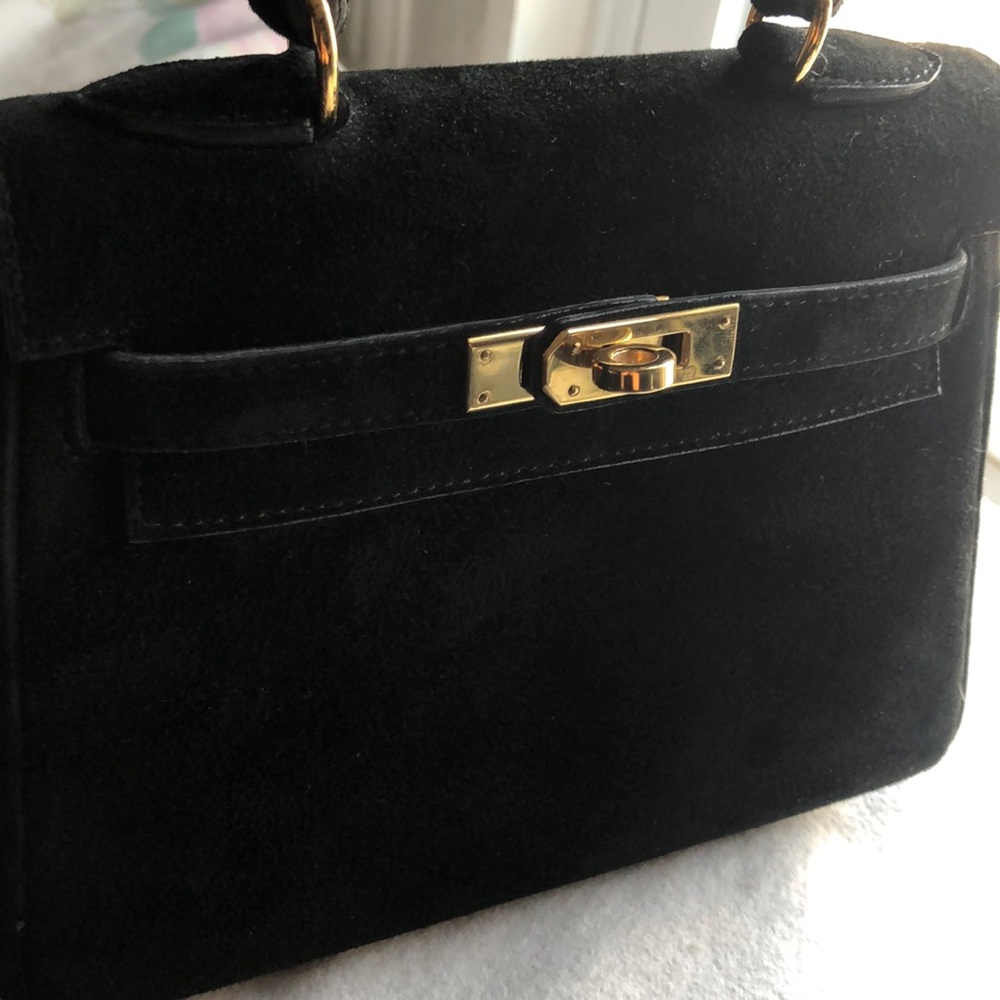 Suede Hermés small purse.